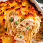 Homemade chicken tetrazzini with creamy spaghetti, shredded chicken, peas, and a golden, bubbly cheese crust.