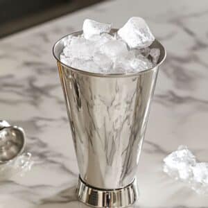 Cracked ice added to shaker for second shake.