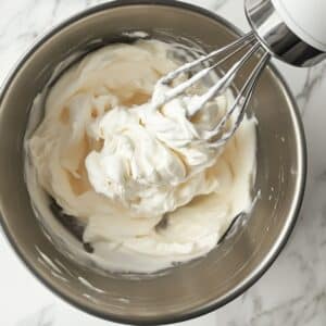 Egg whites whipped to soft peaks for fluffy waffles. Classic diner trick for golden crispness and rise.