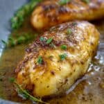 Golden maple dijon chicken breast glazed with sweet mustard sauce and fresh thyme.