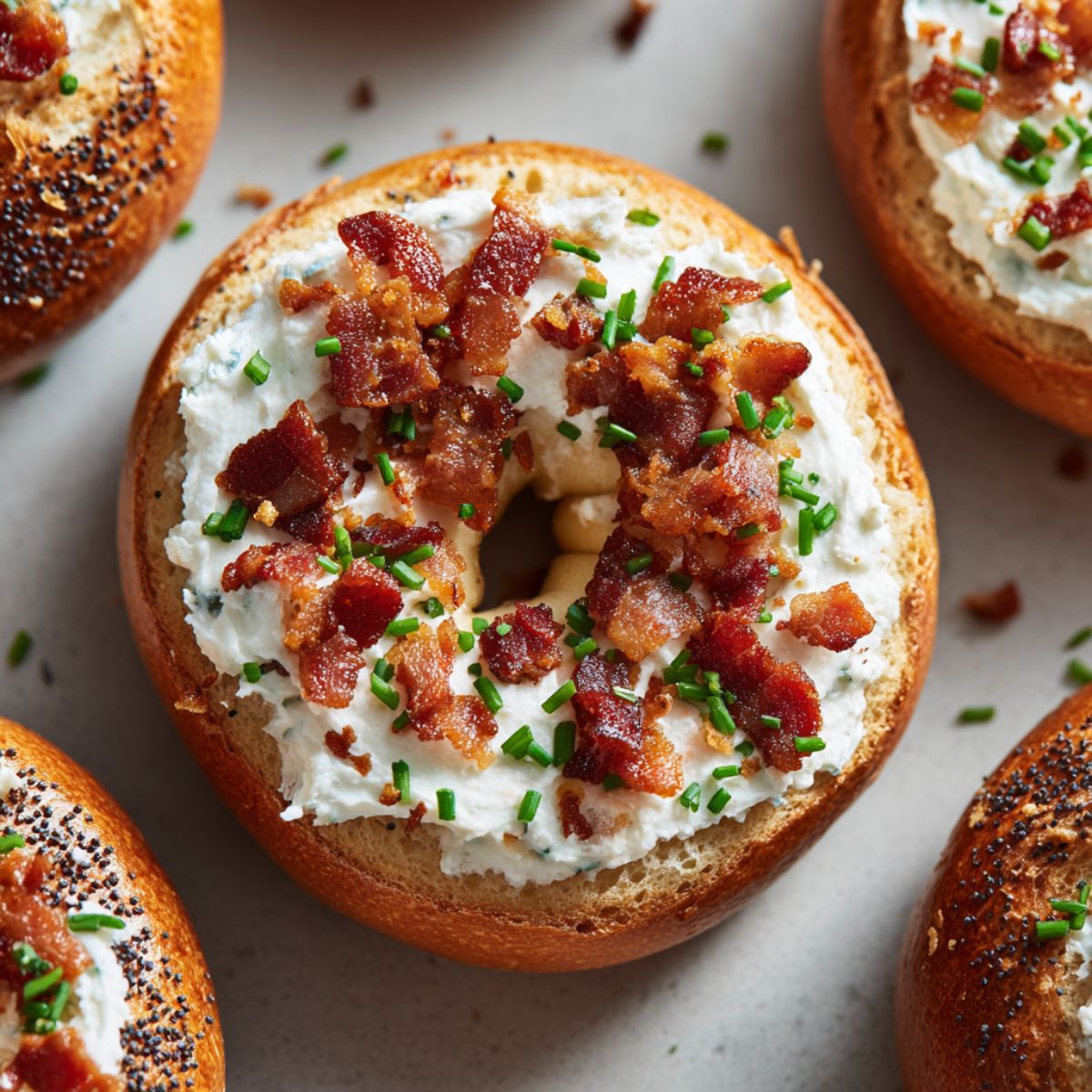 McGriddle bites - breakfast muffin cups combining scrambled eggs, crumbled breakfast sausage, and melted cheddar cheese baked in golden pancake cups with a touch of maple sweetness