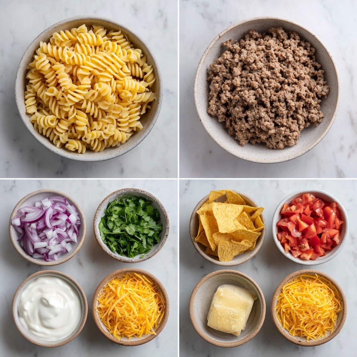 Cheesy taco pasta bake in a glass casserole dish, featuring rotini pasta, melted cheese, ground beef, tomatoes, red onion, and cilantro baked to golden perfection.